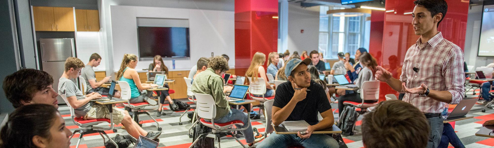 Students sitting at desks in a classroom.