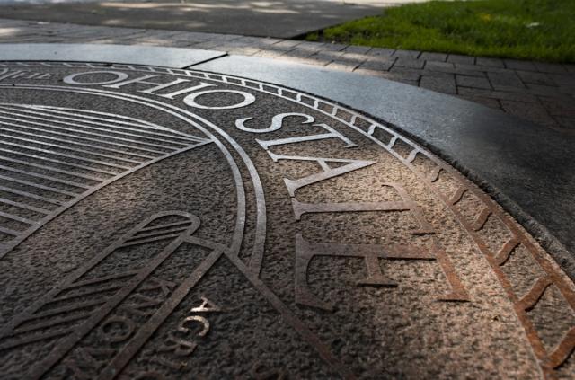 Seal of The Ohio State University in the Oval at Ohio State.